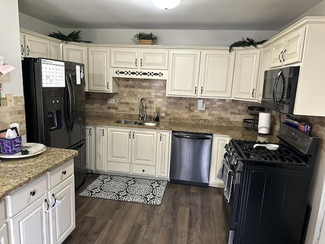 11224 Marley Brook Ct, Orland Park, IL 60467 - kitchen with black appliances, a sink, backsplash, light stone counters, and dark wood-style flooring