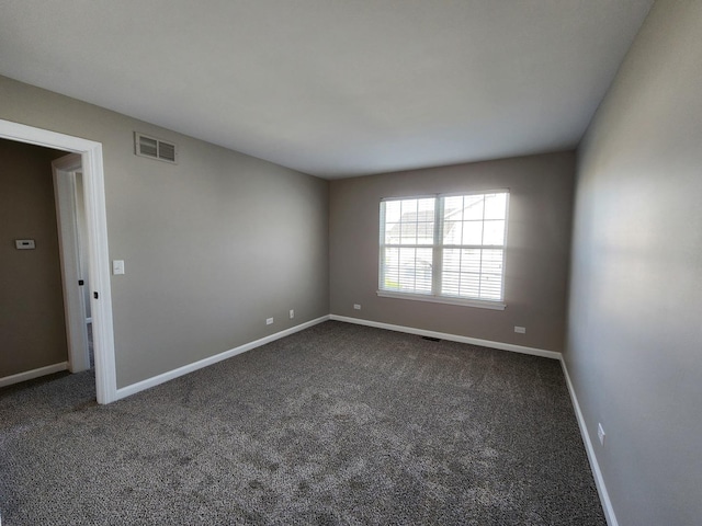 2473 Dickens Dr, Aurora, IL 60503 - carpeted empty room featuring baseboards