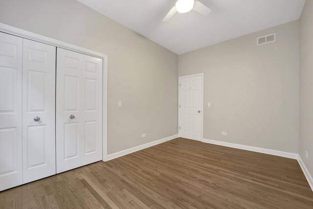 6025 N Ridge Ave Unit 1W, Chicago, IL 60660 - unfurnished bedroom featuring wood finished floors and a ceiling fan