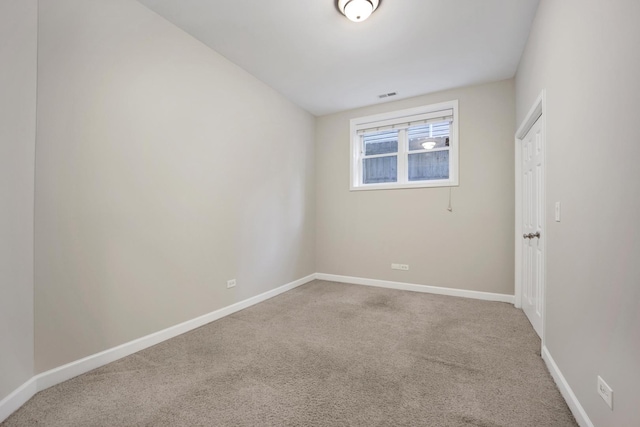6025 N Ridge Ave Unit 1W, Chicago, IL 60660 - unfurnished room featuring carpet and baseboards
