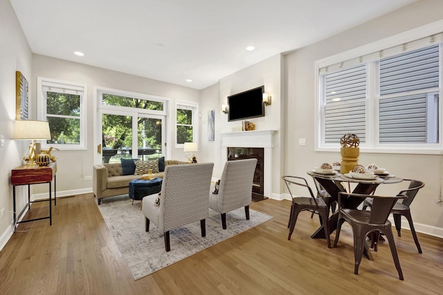 6025 N Ridge Ave Unit 1W, Chicago, IL 60660 - living room with wood finished floors, a fireplace, and recessed lighting