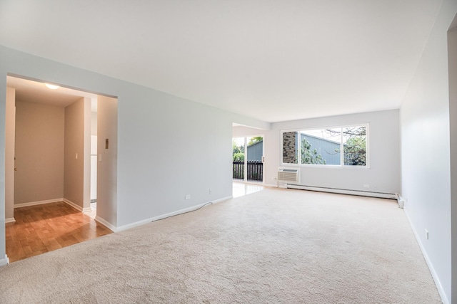 922 E Old Willow Rd Unit 204, Prospect Heights, IL 60070 - unfurnished room featuring carpet, a baseboard radiator, and baseboards