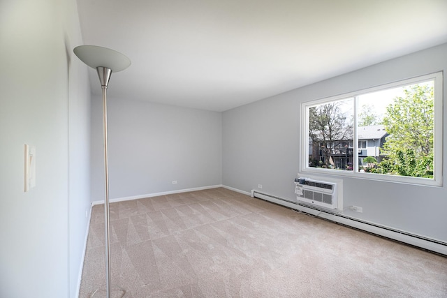 922 E Old Willow Rd Unit 204, Prospect Heights, IL 60070 - spare room featuring a baseboard radiator, light carpet, a wall mounted AC, and baseboards