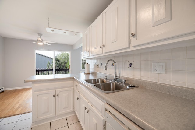922 E Old Willow Rd Unit 204, Prospect Heights, IL 60070 - kitchen featuring a sink, white cabinetry, a peninsula, light tile patterned flooring, and ceiling fan