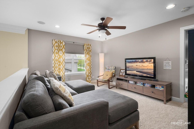 living room with light carpet, ceiling fan, baseboards, and recessed lighting
