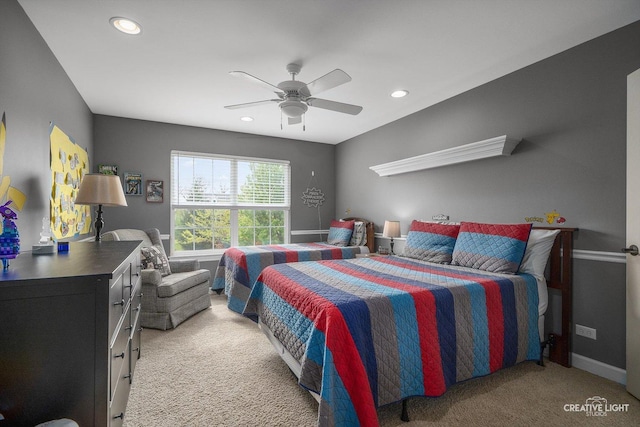 bedroom with light carpet, recessed lighting, ceiling fan, and baseboards