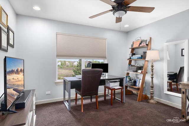office space featuring ceiling fan, dark colored carpet, baseboards, and recessed lighting