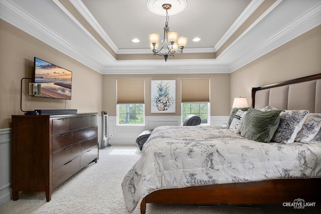staircase featuring a high ceiling, wood finished floors, a decorative wall, a wainscoted wall, and a ceiling fan