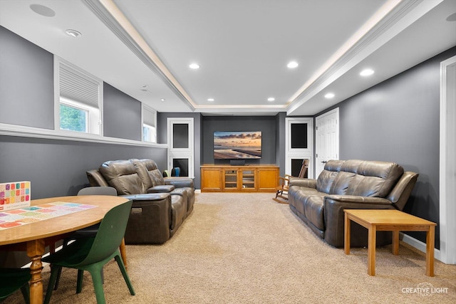 home theater with light carpet, recessed lighting, and a raised ceiling