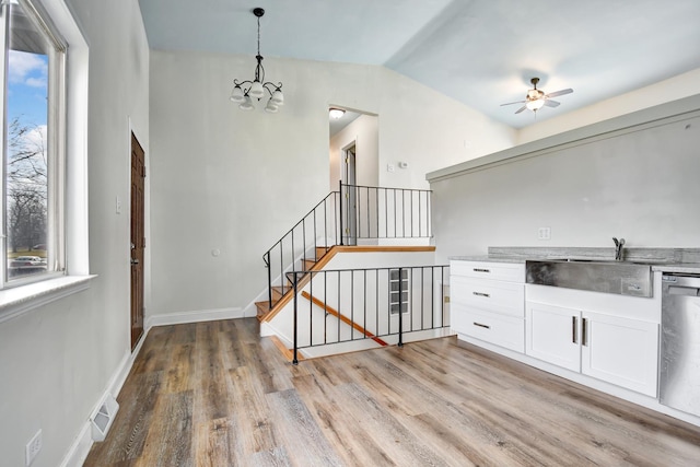 530 Parnell Ave, Chicago Heights, IL 60411 - bar with a sink, light wood-type flooring, ceiling fan, dishwasher, and a chandelier