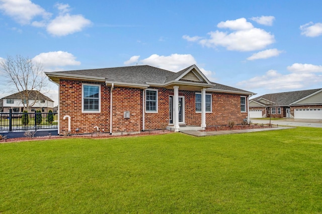 view of front of home with brick siding and a garage