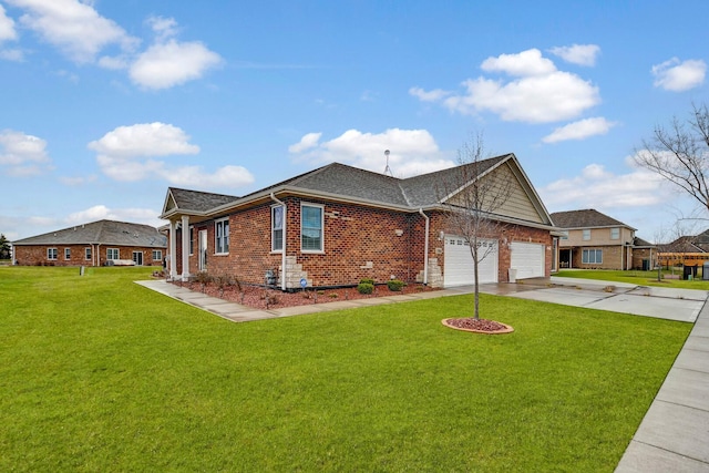 view of front of property featuring a garage, brick siding, driveway, a front yard, and roof with shingles
