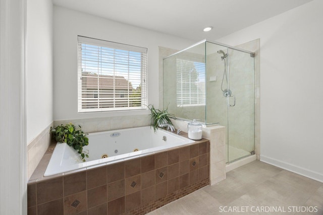 700 Wilmore Dr, Oswego, IL 60543 - full bathroom with a stall shower and a jetted tub