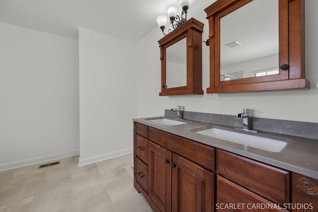 700 Wilmore Dr, Oswego, IL 60543 - full bath with double vanity, baseboards, and tile patterned floors