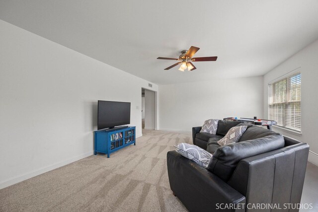 700 Wilmore Dr, Oswego, IL 60543 - carpeted living area featuring ceiling fan and baseboards
