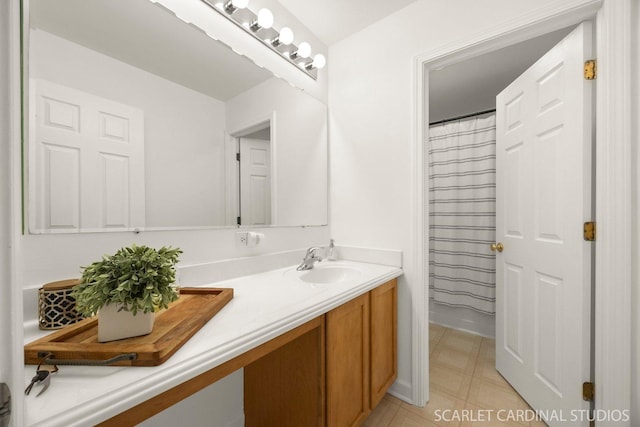 700 Wilmore Dr, Oswego, IL 60543 - bathroom with vanity, tile patterned floors, and a shower with curtain