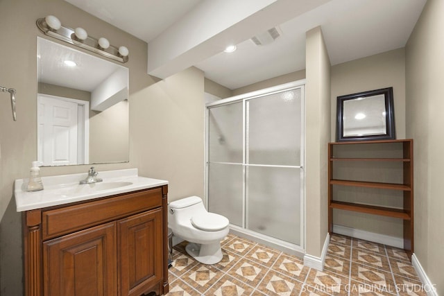 700 Wilmore Dr, Oswego, IL 60543 - bathroom with a shower stall, toilet, vanity, and baseboards