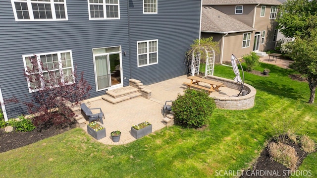 700 Wilmore Dr, Oswego, IL 60543 - rear view of property with a patio area and a lawn