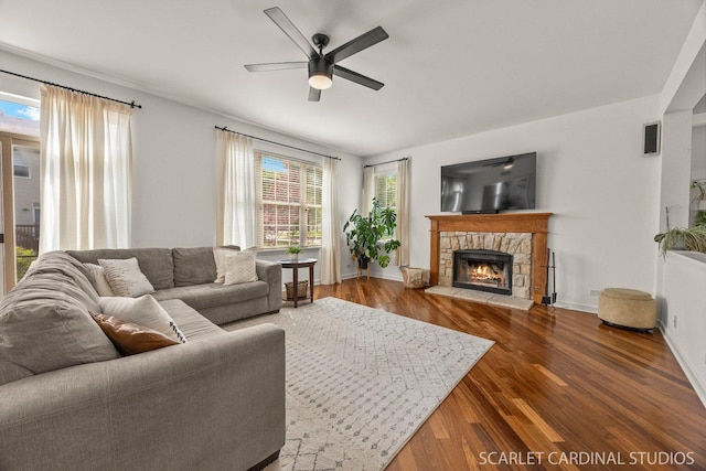 700 Wilmore Dr, Oswego, IL 60543 - living room with a ceiling fan, a fireplace, wood finished floors, and baseboards