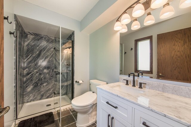 12 James Dr, Westmont, IL 60559 - bathroom featuring a stall shower, toilet, vanity, and tile patterned floors