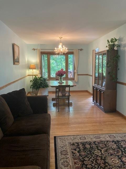 1916 Saginaw Ct, Naperville, IL 60565 - living room featuring light wood-style flooring and a chandelier