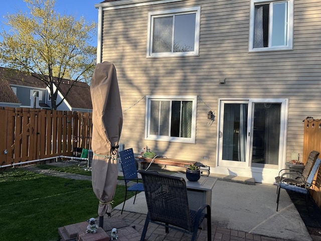 back of house featuring a patio area