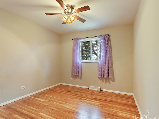 1291 Banbury Rd, Mundelein, IL 60060 - empty room featuring light wood-style floors, a ceiling fan, and baseboards