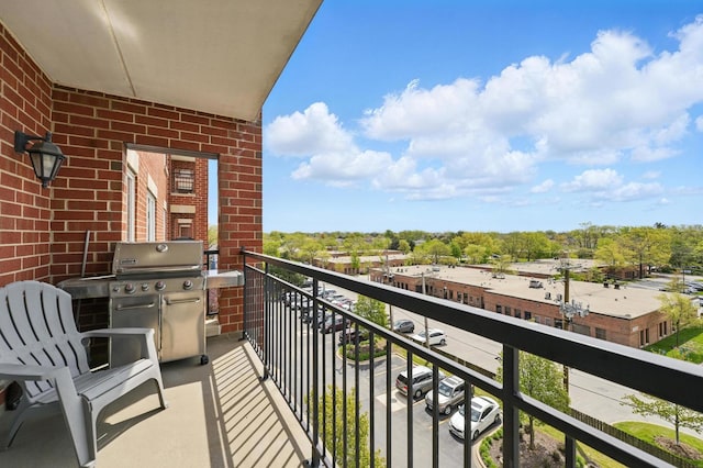 balcony featuring area for grilling