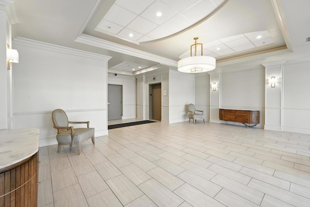 building lobby featuring ornamental molding and recessed lighting