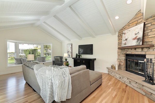 living room with a fireplace, light wood-style flooring, baseboards, and recessed lighting