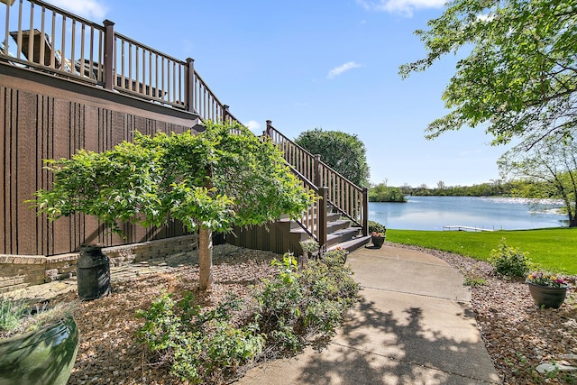 15521 S Mallard Ln, Homer Glen, IL 60491 - view of property exterior featuring a water view, stairway, a yard, and board and batten siding