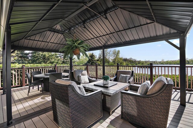 15521 S Mallard Ln, Homer Glen, IL 60491 - wooden deck featuring outdoor dining space, a water view, and an outdoor living space