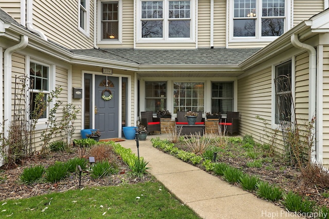 2114 Prairie St, Glenview, IL 60025 - view of exterior entry with roof with shingles