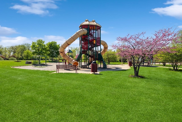 community play area featuring a lawn