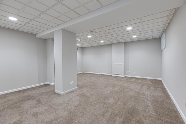 finished basement featuring carpet flooring, recessed lighting, and baseboards