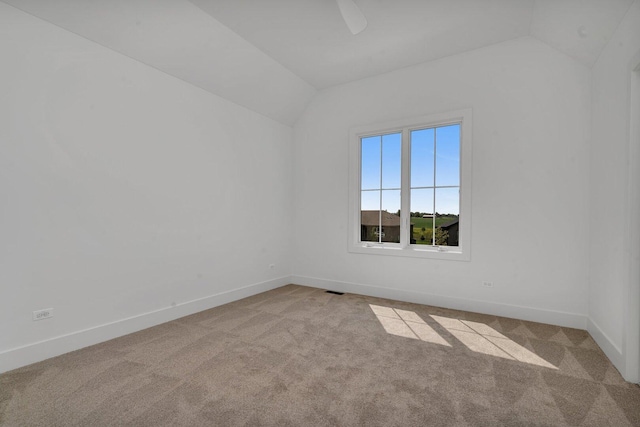 1051 Kinley Dr, New Lenox, IL 60451 - carpeted empty room with lofted ceiling, baseboards, and a ceiling fan