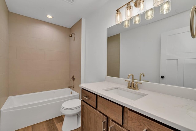 1051 Kinley Dr, New Lenox, IL 60451 - bathroom with wood finished floors, tub / shower combination, toilet, and vanity
