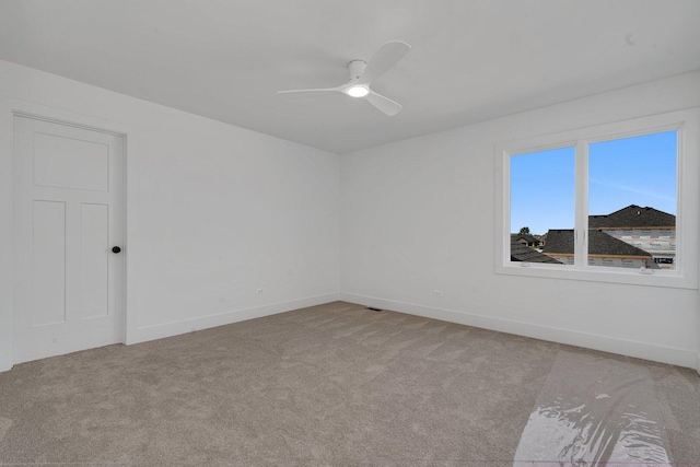 1051 Kinley Dr, New Lenox, IL 60451 - empty room with light colored carpet, ceiling fan, and baseboards
