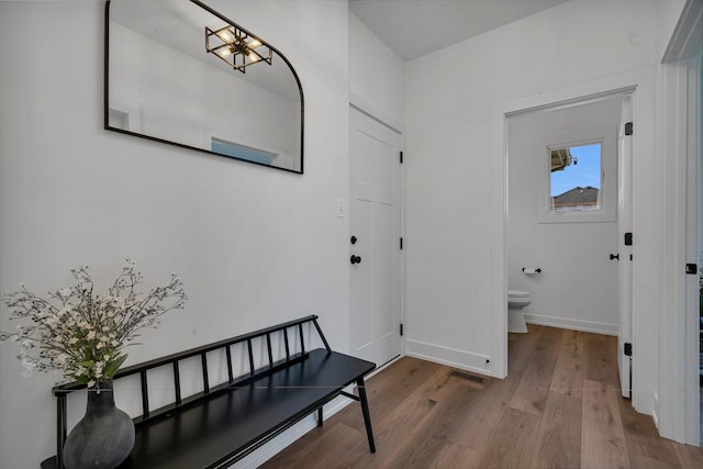 1051 Kinley Dr, New Lenox, IL 60451 - doorway to outside featuring wood finished floors and baseboards