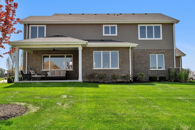 1051 Kinley Dr, New Lenox, IL 60451 - back of house with an outdoor hangout area, a patio area, brick siding, a yard, and a ceiling fan