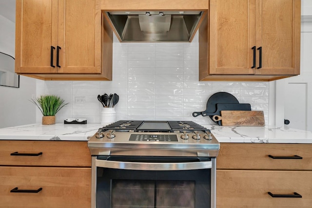 1051 Kinley Dr, New Lenox, IL 60451 - kitchen featuring stainless steel range with gas stovetop, range hood, tasteful backsplash, and light stone counters
