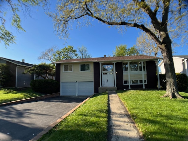 2508 Mitchell Dr, Woodridge, IL 60517 - raised ranch with an attached garage, driveway, and a front yard