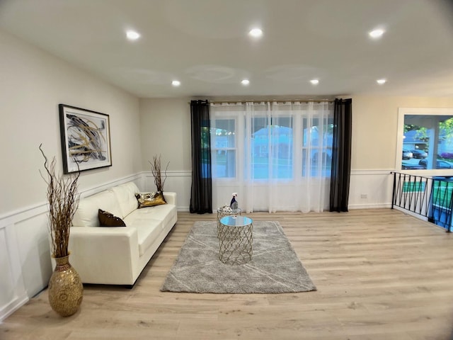 2508 Mitchell Dr, Woodridge, IL 60517 - living area with wood finished floors, recessed lighting, a wainscoted wall, and a decorative wall