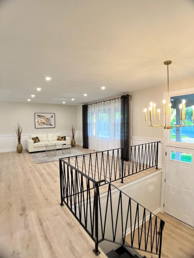 2508 Mitchell Dr, Woodridge, IL 60517 - staircase with a chandelier, wood finished floors, and recessed lighting