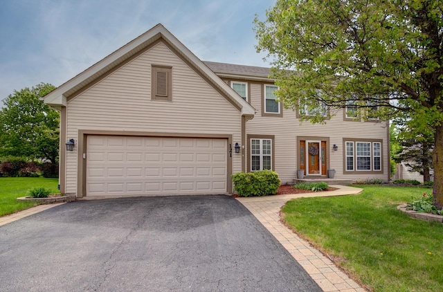 view of front of property with driveway and a front yard