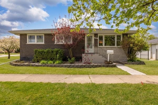 15100 Hamlin Ave, Midlothian, IL 60445 - ranch-style house featuring a front lawn and brick siding