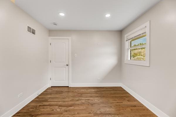 15100 Hamlin Ave, Midlothian, IL 60445 - unfurnished room featuring recessed lighting, baseboards, and wood finished floors