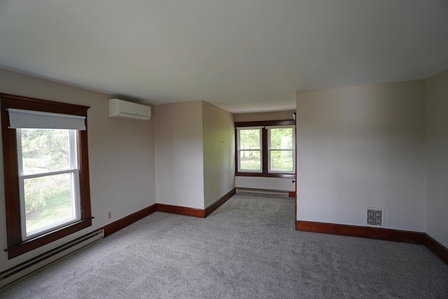 1511 Becker School Rd, Freeport, IL 61032 - carpeted empty room featuring a baseboard radiator, baseboards, and a wall mounted air conditioner