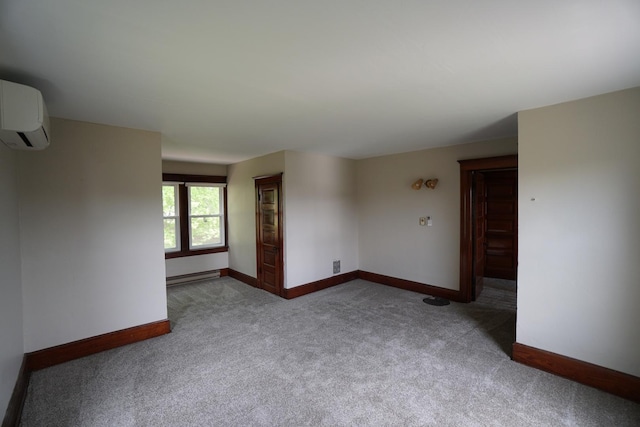 1511 Becker School Rd, Freeport, IL 61032 - unfurnished room featuring baseboard heating, carpet floors, a wall unit AC, and baseboards