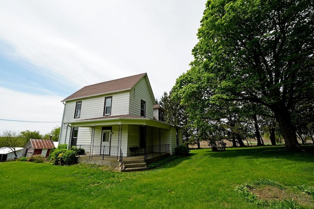 1511 Becker School Rd, Freeport, IL 61032 - view of property exterior featuring a porch and a yard